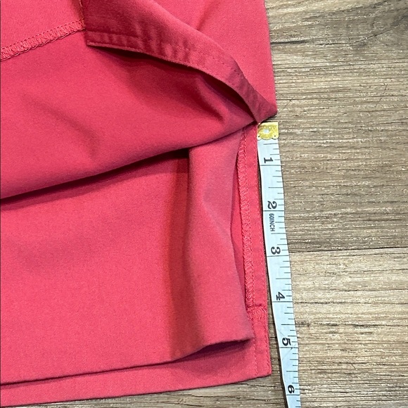 Izod C-Flex Coral/Melon Golf Skort - Picture 9 of 9